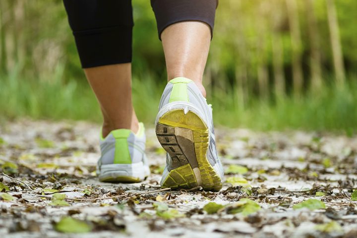 Woman Walking on trail Outdoor Jogging exercise Healthy lifestyl