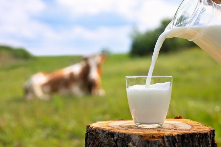 milk pouring into glass