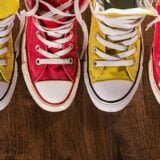 multicolored youth gym shoes on floor