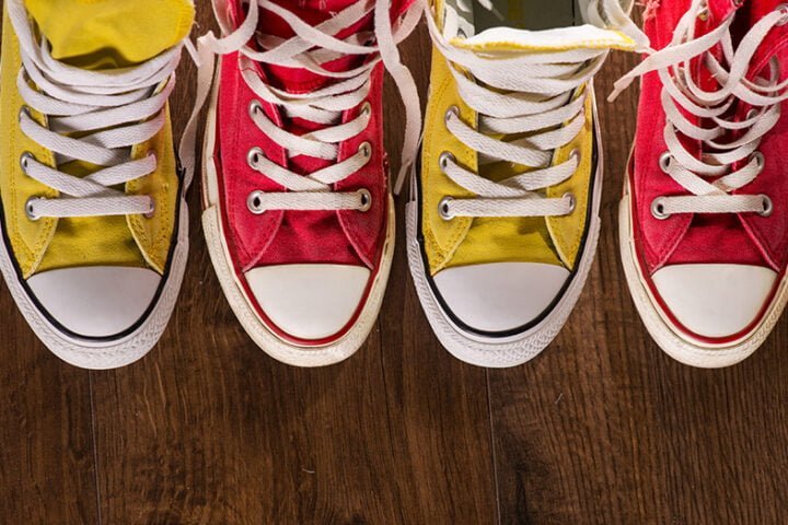 multicolored youth gym shoes on floor