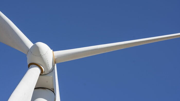 Detail of a windmill with a blue sky