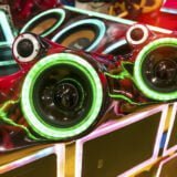colorful lights of stereo and speakers in car in the night