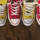 multicolored youth gym shoes on floor