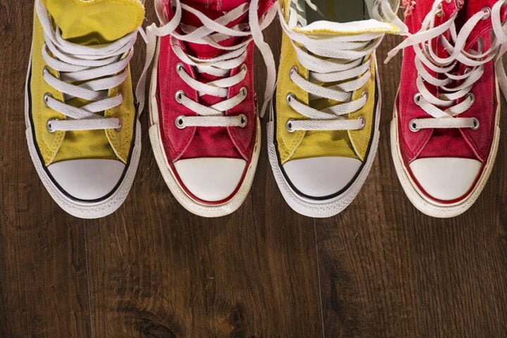 multicolored youth gym shoes on floor