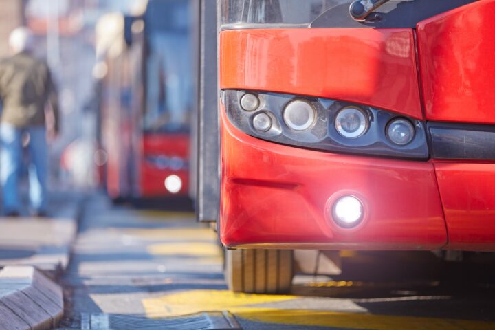Public transportation / bus in urban surroundings on a station.