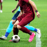 banner of soccer game players fighting for football